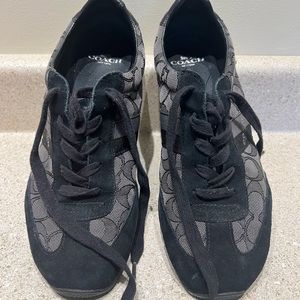 Very gently used women’s Coach sneakers size 10 in black and gray.